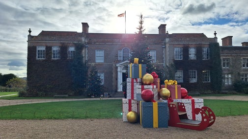 Christmas sleigh with Hinton Ampner house in the background